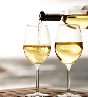 Wine being 1poured into a wine glass